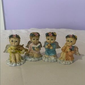 Set of Four Angel Figurines with Instruments